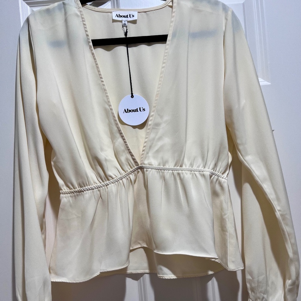 About Us Cream Top